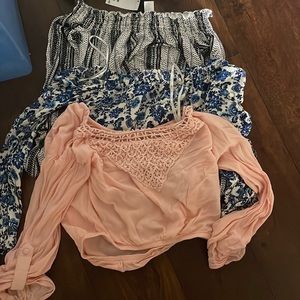 3 long sleeve crop tops 2 shirts have tags on them